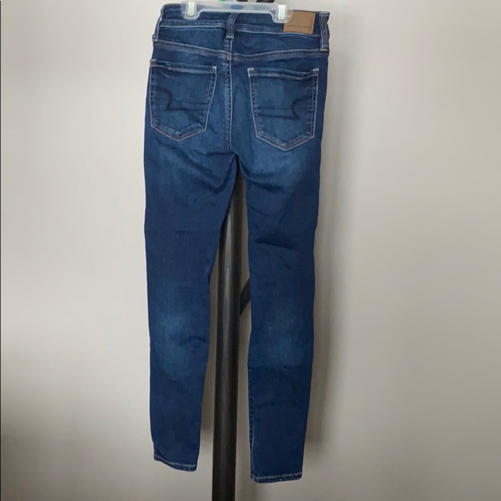 Medium Wash Ripped Jeans - Picture 2 of 4